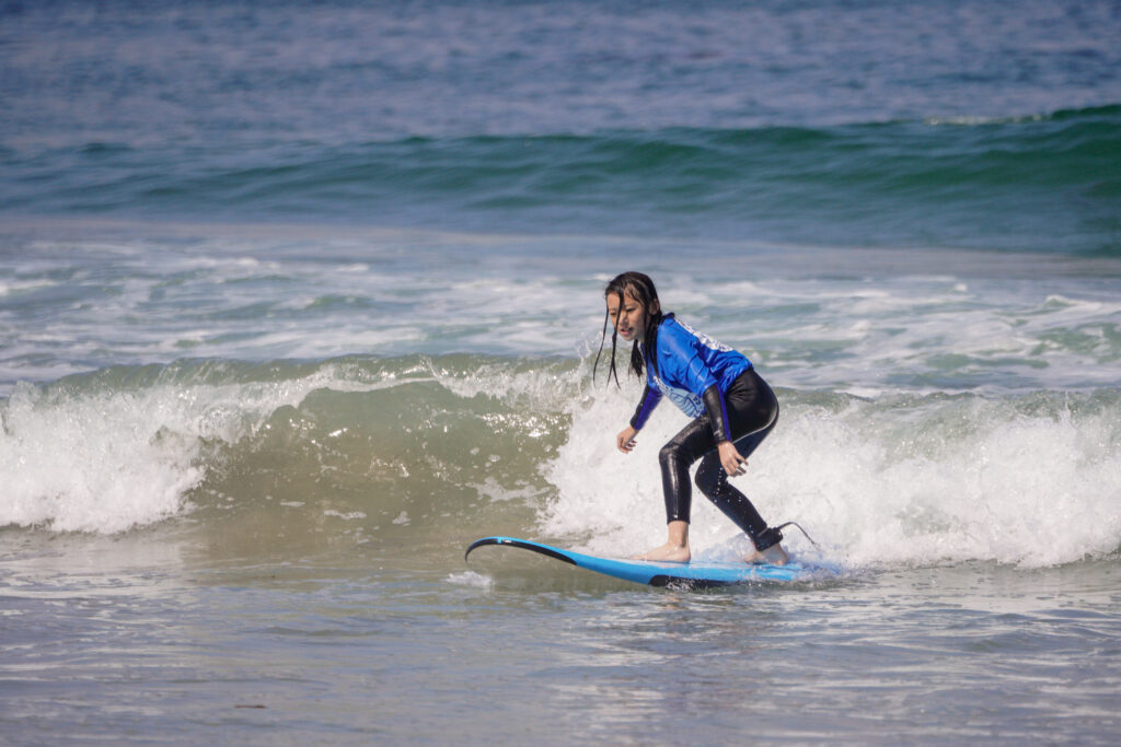 A student learning to surf